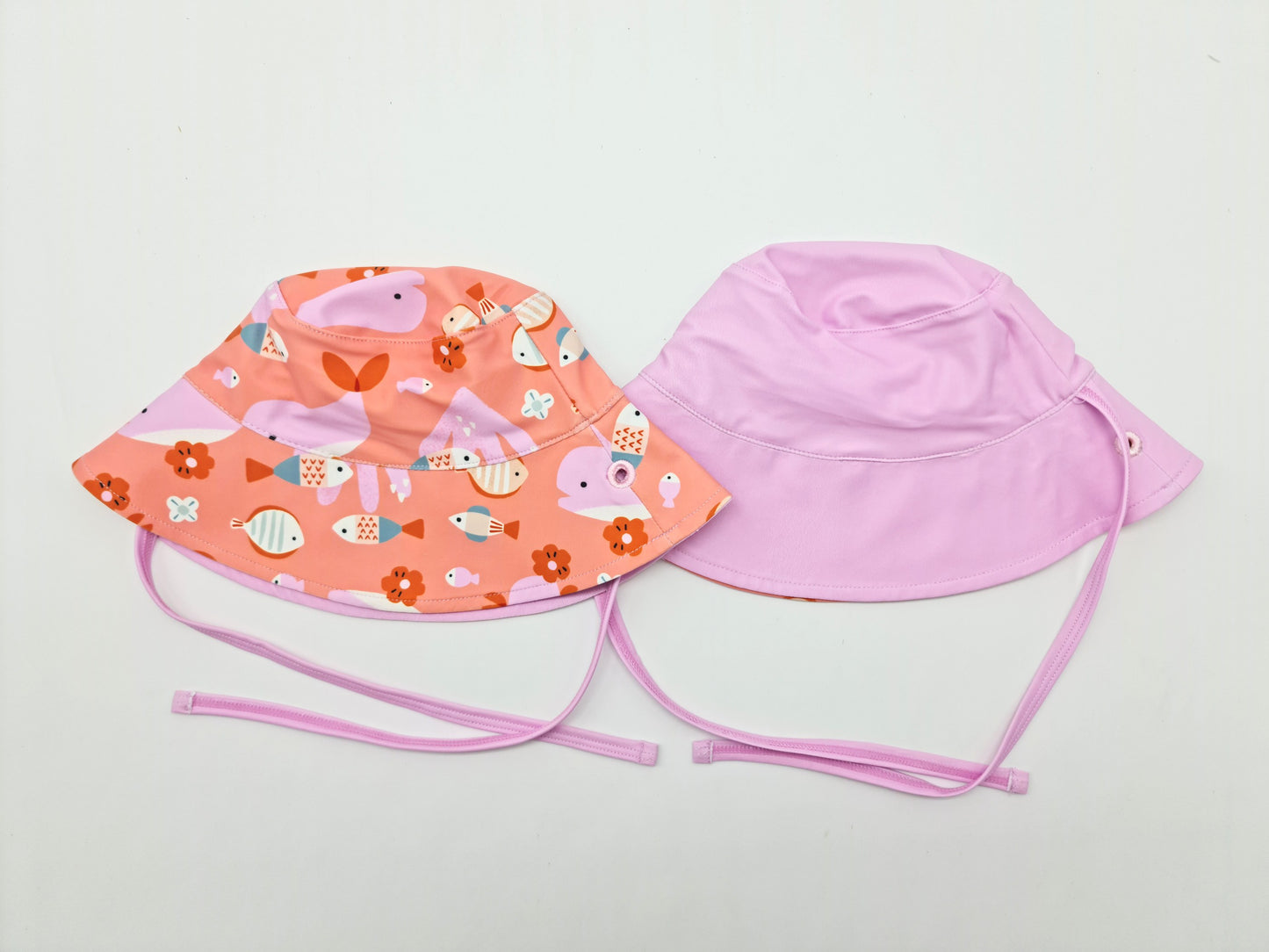 Gorro bucket reversible pr. Solar UPF 50+ - Coral Coral