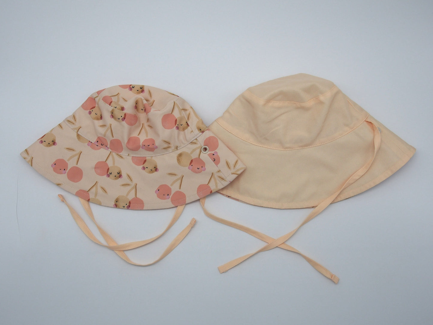 Gorro bucket reversible pr. Solar UPF 50+ - Melocoton Cherry - vista 2