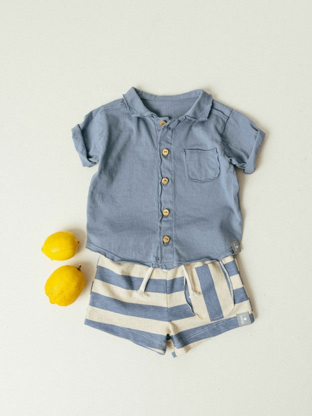 Polo de punto liso con bolsillo Snug, índigo