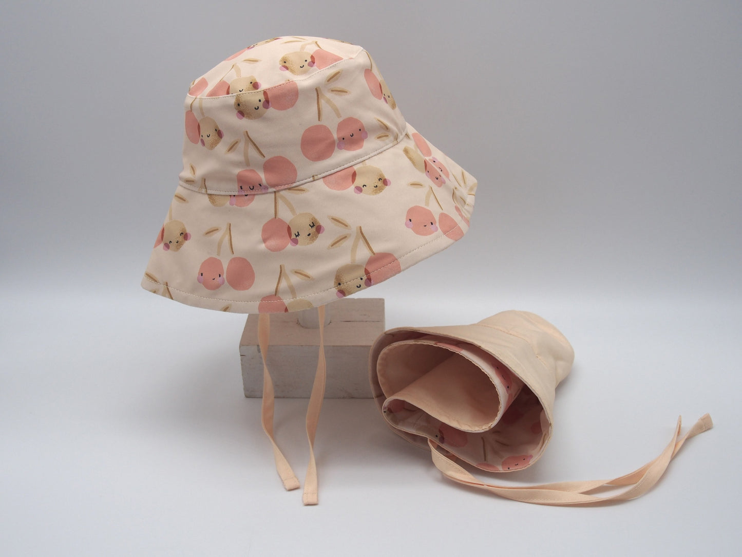 Gorro bucket reversible pr. Solar UPF 50+ - Melocoton Cherry