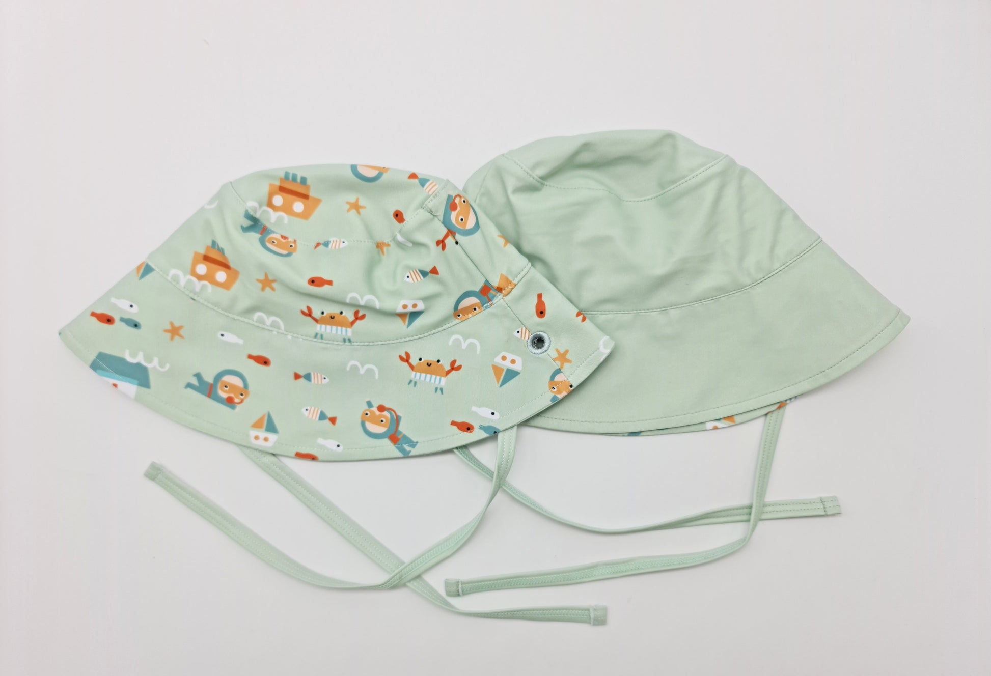 Gorro bucket reversible pr. Solar UPF 50+ - Menta Diver
