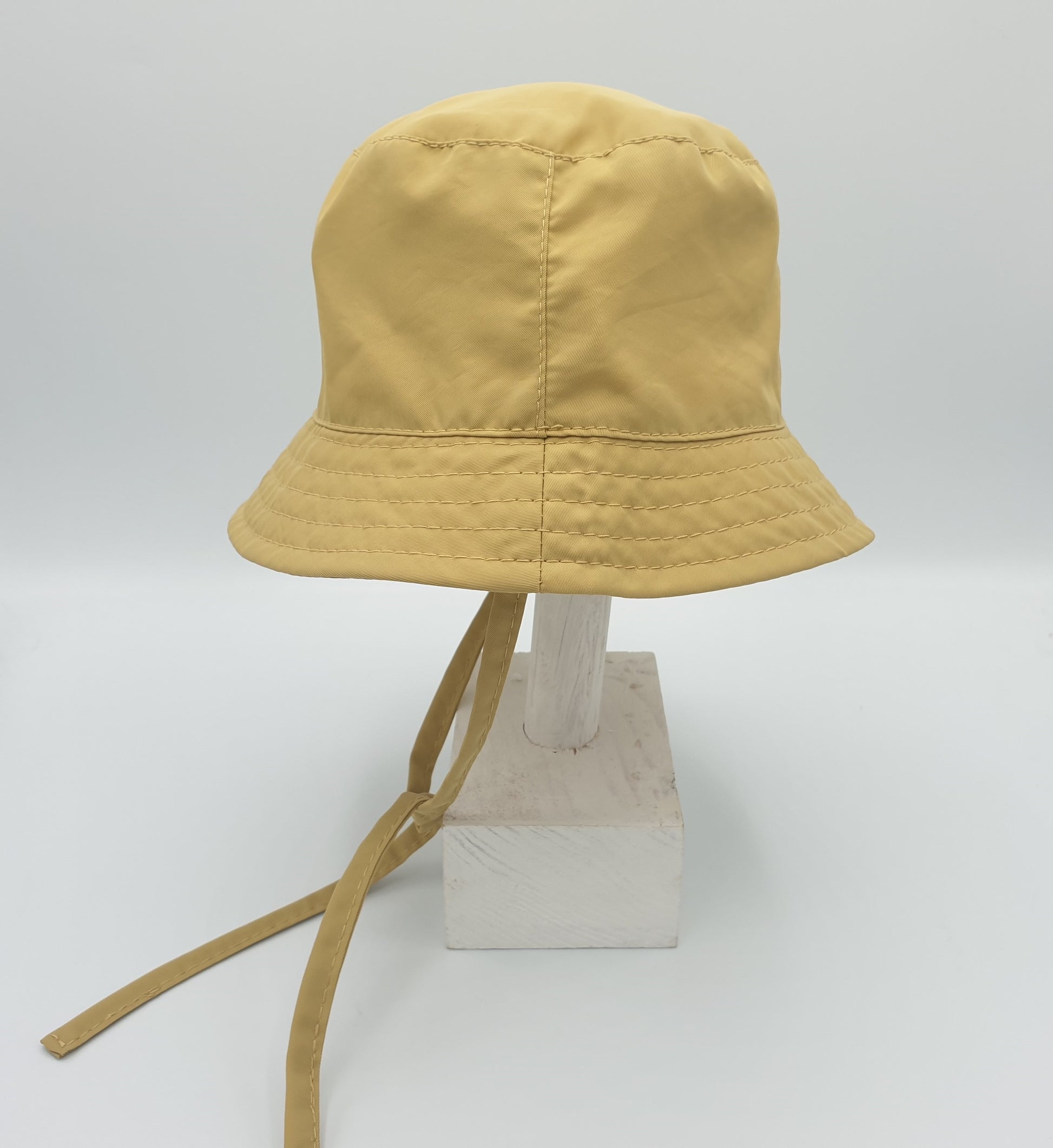 Bucket proteccion solar UPF 50+ - Mostaza