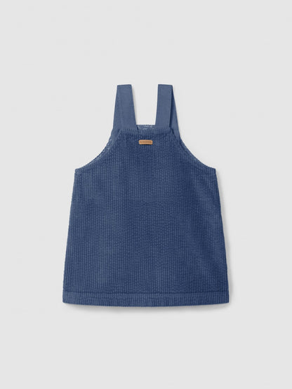 Falda con peto de pana con bolsillos y volante Laranjinha, indigo