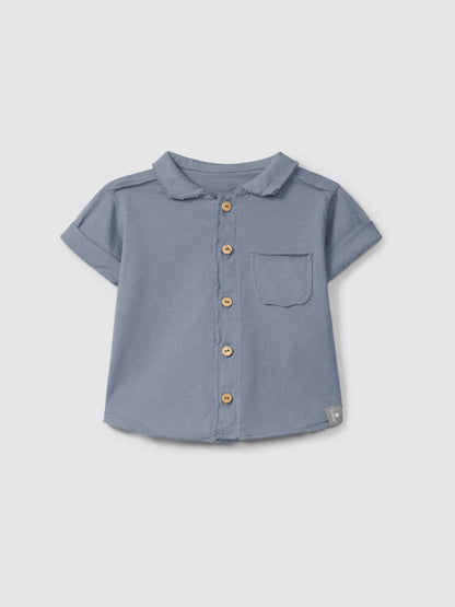 Polo de punto liso con bolsillo Snug, índigo