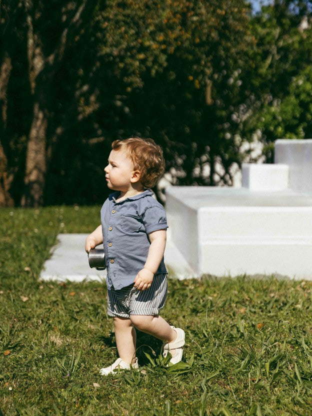 Polo de punto liso con bolsillo Snug, índigo