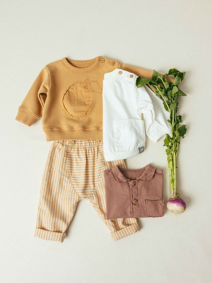 Polo de punto liso con bolsillo Snug, terracota