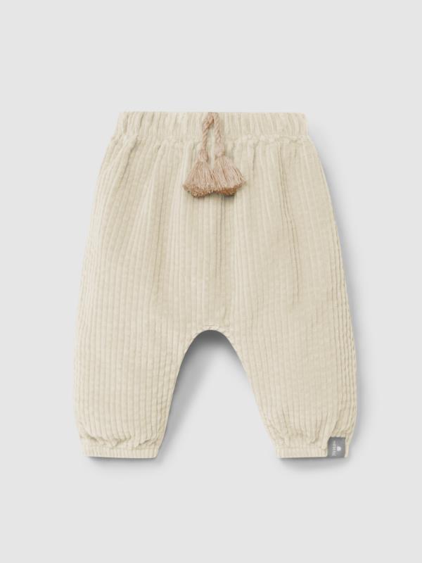Pantalón pull-up de terciopelo acanalado y detalle de cordón con pompón