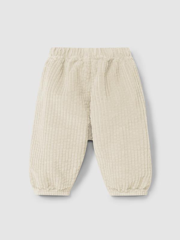 Pantalón pull-up de terciopelo acanalado y detalle de cordón con pompón