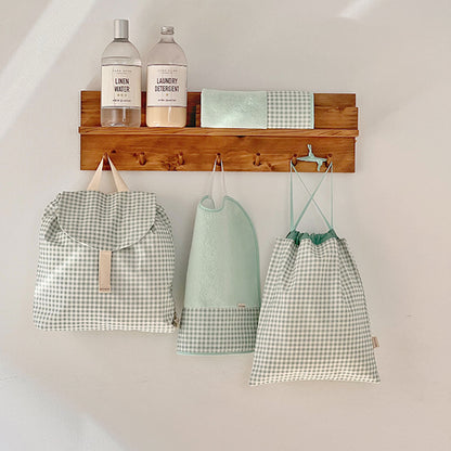 Detalle babero con goma Doymon Nuba